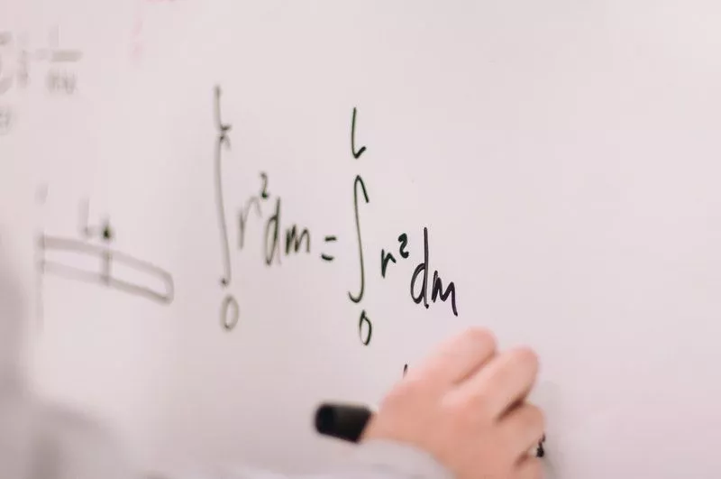 An engineering student solving integral equations.